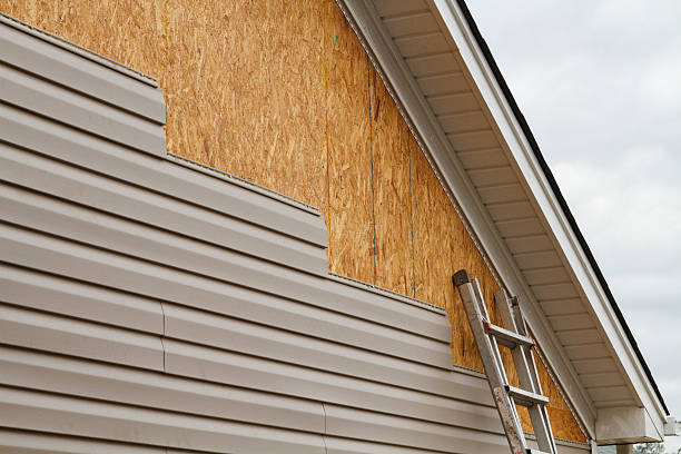 Professional Fiber Cement Siding technician working in East Springfield, OH